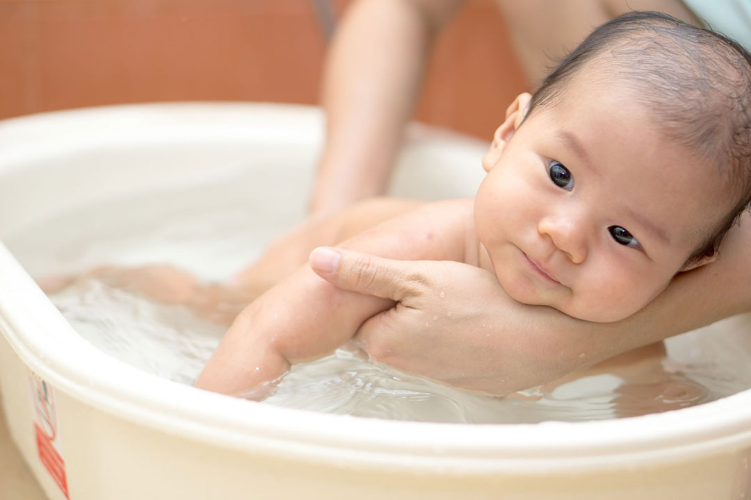Clean the baby with soapy water